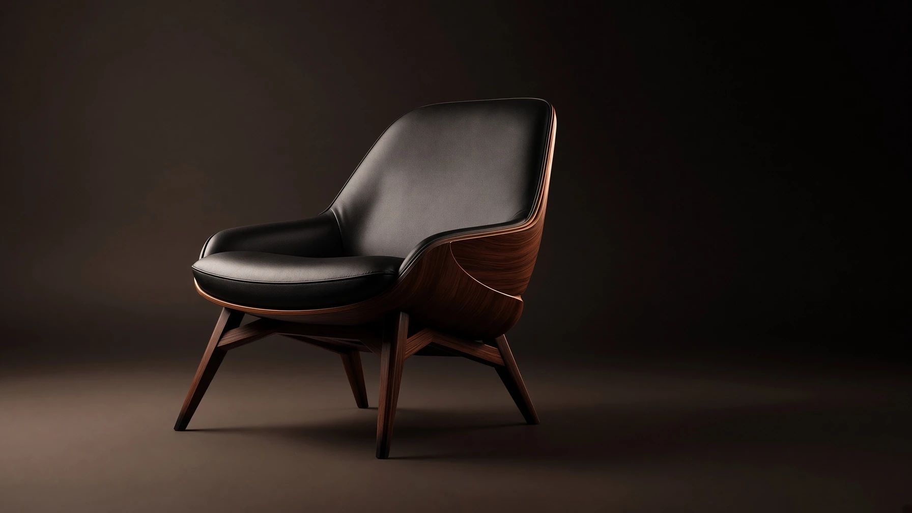A walnut and black leather lounge chair lit against a warm brown studio sweep