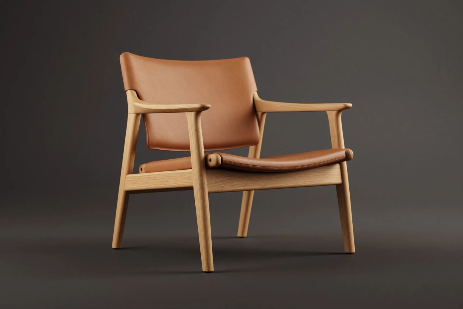 Oak-framed lounge chair with a tan leather sling seat on a grey background