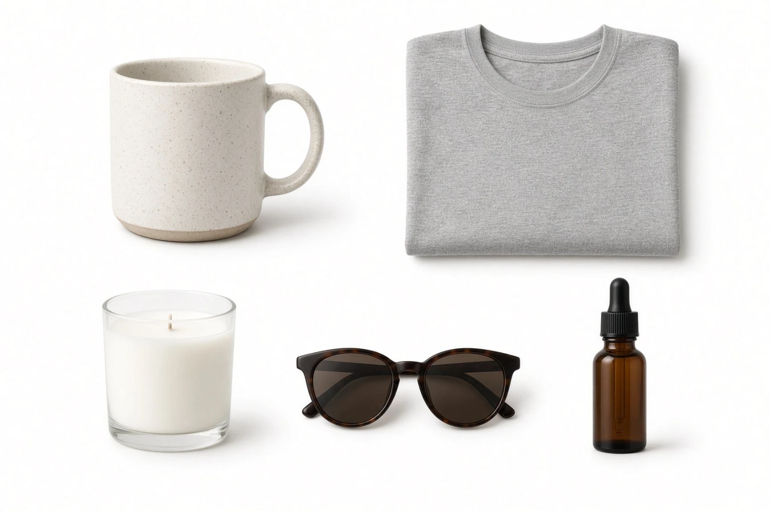 Five products flat-lit on white — a mug, folded sweatshirt, candle, sunglasses and dropper bottle